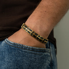 Pfeilarmband aus Ebenholzgold