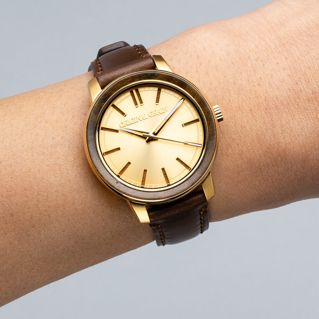 Ebenholzgoldfarbener Damen-Lederschaft 36 mm